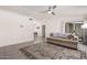 Open concept living room featuring tile flooring, neutral decor and sliding glass door to the backyard at 19202 N 14Th St, Phoenix, AZ 85024