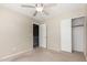Bedroom boasts a sliding-door closet and an entrance to the hallway, maximizing space and functionality at 1968 E Emily Ln, Gilbert, AZ 85295