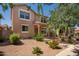 Inviting two-story home with a covered entryway and desert landscaping at 1968 E Emily Ln, Gilbert, AZ 85295