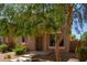 Inviting two-story home with covered porch and neutral color palette at 1968 E Emily Ln, Gilbert, AZ 85295
