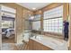 Bathroom featuring bathtub and separate glass shower at 19714 N Rim Dr, Surprise, AZ 85374