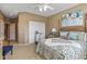 Bedroom featuring carpet, and closet at 19714 N Rim Dr, Surprise, AZ 85374