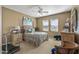 Bedroom with carpet, natural lighting, ceiling fan and décor at 19714 N Rim Dr, Surprise, AZ 85374