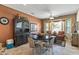Cozy breakfast nook features a circular table and a large bay window with seating at 19714 N Rim Dr, Surprise, AZ 85374