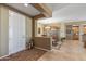 Inviting entryway showcases a neutral color palette, tile flooring, and seamless transition into the dining and kitchen areas at 19714 N Rim Dr, Surprise, AZ 85374