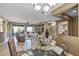 Open-concept living area with neutral decor, tile floors, and seamless flow to the dining and outdoor spaces at 19714 N Rim Dr, Surprise, AZ 85374