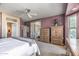 This bedroom features light-colored carpet and a ceiling fan at 19714 N Rim Dr, Surprise, AZ 85374