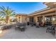 Extensive patio with multiple seating areas, ideal for entertaining and enjoying outdoor living at 19714 N Rim Dr, Surprise, AZ 85374