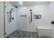 Luxurious bathroom with a glass-enclosed shower, tiled walls, and modern fixtures at 20121 N 76Th St # 1019, Scottsdale, AZ 85255