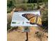 Butterfly Garden at Grayhawk sign with Monarch butterfly information and lifecycle images at 20121 N 76Th St # 1019, Scottsdale, AZ 85255