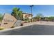 Community entrance sign with desert landscaping and views of the property at 20121 N 76Th St # 1019, Scottsdale, AZ 85255