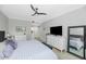 The main bedroom boasts a ceiling fan, modern decor, and an ensuite bathroom at 20121 N 76Th St # 1019, Scottsdale, AZ 85255