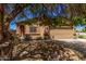 Charming single-story home with desert landscaping and a two-car garage at 2024 E Dust Devil Dr, San Tan Valley, AZ 85143