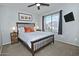 Inviting bedroom features a large window and neutral color palette at 20638 N 11Th St, Phoenix, AZ 85024