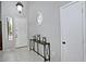 Inviting entryway featuring light tile flooring, neutral walls, and stylish decor at 20638 N 11Th St, Phoenix, AZ 85024