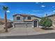 Charming two-story home with a three-car garage and desert landscaping in a sunny neighborhood at 20638 N 11Th St, Phoenix, AZ 85024