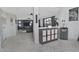 Stylish hallway with modern cabinet, wine rack, and a view into the living room at 20638 N 11Th St, Phoenix, AZ 85024