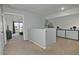 Hallway features carpet flooring, neutral paint, and open access to the living area at 20638 N 11Th St, Phoenix, AZ 85024