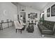Spacious living room featuring neutral walls, tile floors, and high ceilings at 20638 N 11Th St, Phoenix, AZ 85024