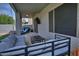 Relaxing covered patio featuring comfortable seating, outdoor television, and stylish decor at 20638 N 11Th St, Phoenix, AZ 85024