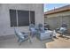 Inviting patio with modern fire pit, comfortable chairs, and serene outdoor ambiance at 20638 N 11Th St, Phoenix, AZ 85024
