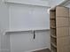 Functional walk-in closet with shelving for optimal storage and organization at 20638 N 11Th St, Phoenix, AZ 85024