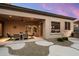 Relax on the outdoor patio featuring stone landscaping and ample room for seating at 22231 N 55Th St, Phoenix, AZ 85054