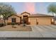 Charming single-story home with a neutral color palette, well-maintained landscaping, and a convenient two-car garage at 22231 N 55Th St, Phoenix, AZ 85054