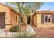 Charming single-Gathering home with a stone front door and landscaped front yard at 22815 N Arrellaga Dr, Sun City West, AZ 85375