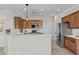 Bright kitchen with stainless steel appliances and ample counter space at 22815 N Arrellaga Dr, Sun City West, AZ 85375