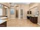 Bright bathroom showcasing a soaking tub, walk-in shower, and dual vanities at 2304 N Steele Cir, Mesa, AZ 85207