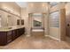 Inviting bathroom featuring a large tub and walk-in shower at 2304 N Steele Cir, Mesa, AZ 85207