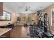 Bright and airy exercise room with multiple windows and modern workout equipment at 2304 N Steele Cir, Mesa, AZ 85207
