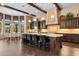 Expansive kitchen island with seating, custom cabinetry, and pendant lighting at 2304 N Steele Cir, Mesa, AZ 85207