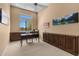 Inviting office with a large window, built-in cabinets, and ample natural light at 2304 N Steele Cir, Mesa, AZ 85207