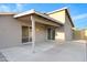 A covered back patio features recessed lights and two sliding glass doors for easy indoor/outdoor living at 23829 N 36Th Dr, Glendale, AZ 85310
