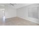Living room with neutral color walls, tile flooring, and a ceiling fan at 23829 N 36Th Dr, Glendale, AZ 85310