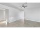 Bright living room featuring tile floors, a ceiling fan, and neutral walls at 23829 N 36Th Dr, Glendale, AZ 85310