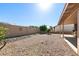 Expansive backyard featuring low-maintenance desert landscaping and a covered patio for outdoor living at 2757 Leisure World --, Mesa, AZ 85206