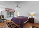 Bedroom with a ceiling fan and wood-look floors at 2757 Leisure World --, Mesa, AZ 85206