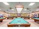 Large, well-lit game room with multiple billiard tables and a view of the community at 2757 Leisure World --, Mesa, AZ 85206