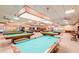 Open concept game room featuring many billiard tables for social gatherings at 2757 Leisure World --, Mesa, AZ 85206