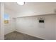 Bright closet featuring a window, storage and shelving, and soft carpet flooring at 29706 N 127Th Ln, Peoria, AZ 85383