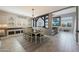 Inviting dining area featuring a dining table, and stylish shiplap walls and decor at 29706 N 127Th Ln, Peoria, AZ 85383