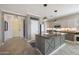 Well-lit kitchen with a kitchen island, modern appliances, and stylish interior design elements at 29706 N 127Th Ln, Peoria, AZ 85383