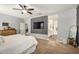 View of the main bedroom and a glimpse into the en-suite bathroom at 30208 W Fairmount Ave, Buckeye, AZ 85396