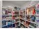 Well-stocked walk-in pantry provides plenty of storage space at 30213 W Fairmount Ave, Buckeye, AZ 85396