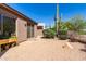 Desert-landscaped backyard with low-maintenance gravel and patio at 32627 N 70Th St, Scottsdale, AZ 85266