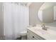 Bathroom featuring a vanity, toilet, and bathtub with shower curtain at 32627 N 70Th St, Scottsdale, AZ 85266