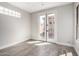 Bright bedroom features tile floors, neutral walls, and access to the outdoor patio at 32627 N 70Th St, Scottsdale, AZ 85266